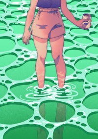 a girl standing in the water with a cup of coffee